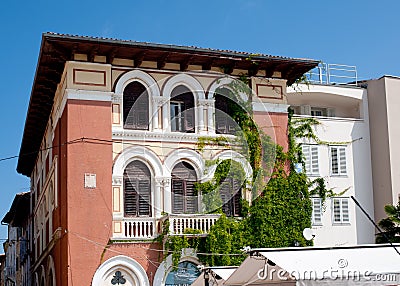 View on old building on the street Obala marsala Tita, Porec, Cr Editorial Stock Photo